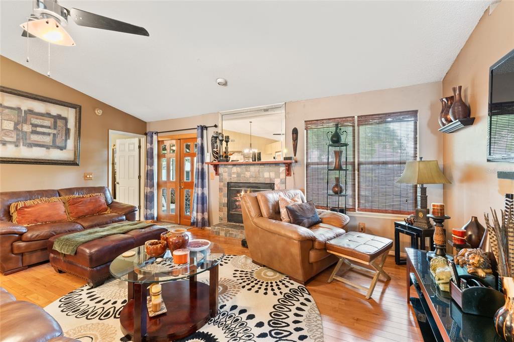 9083 Sable Ridge Court Jacksonville, FL 32244 - Photo 10 of 38 a living room with furniture and a floor to ceiling window