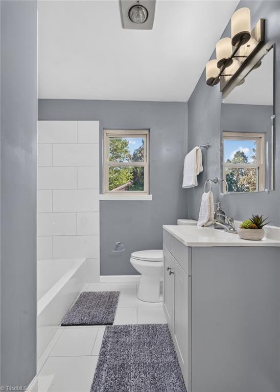 113 Green Valley Road Greensboro, NC 27403 - Photo 31 of 46 Updated bathrooms continue the home's move-in-ready appeal with clean finishes and thoughtful design.