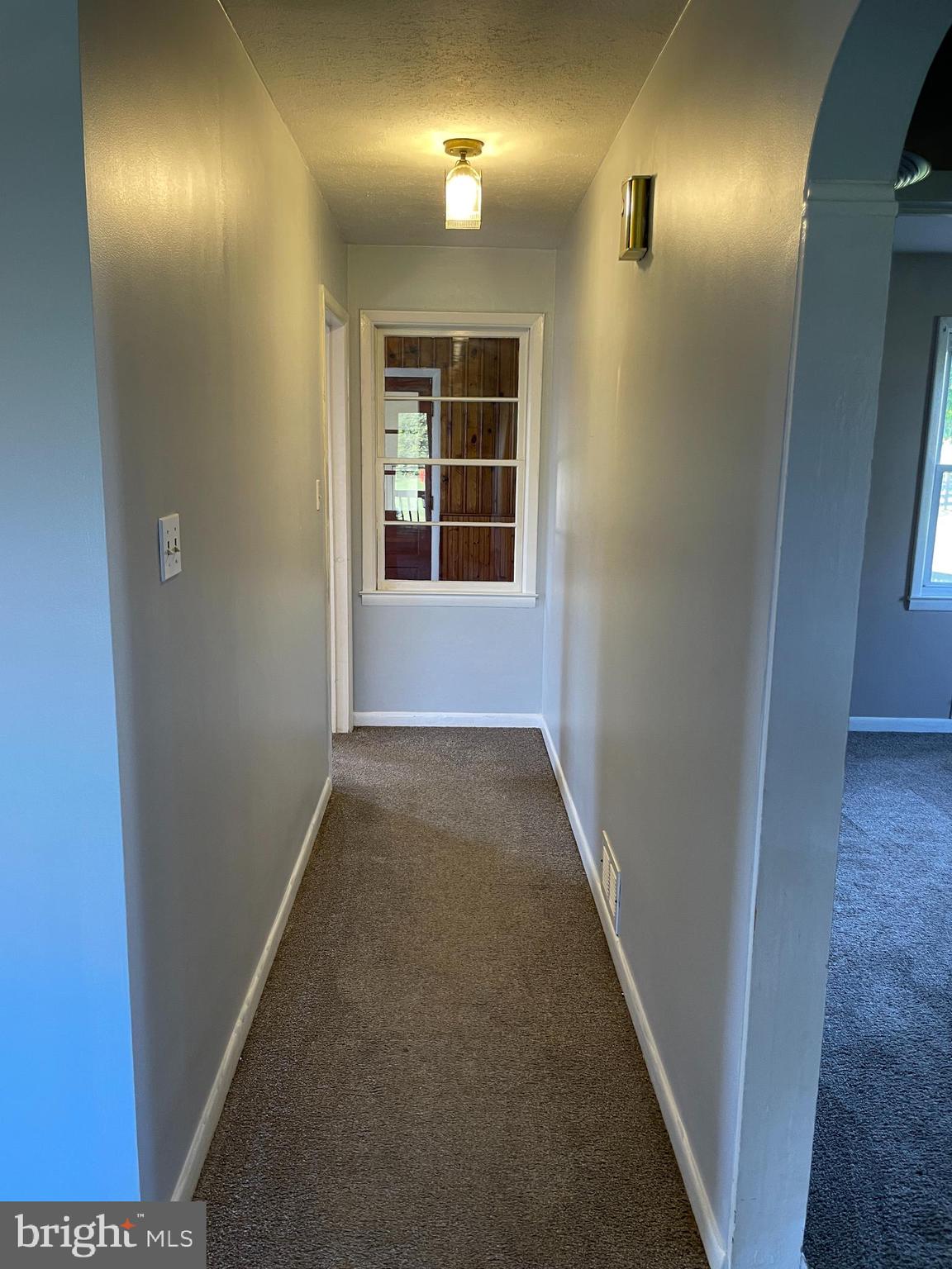 1067 North Mildred Street Ranson, WV 25438 - Photo 22 of 38 a view of hallway with windows