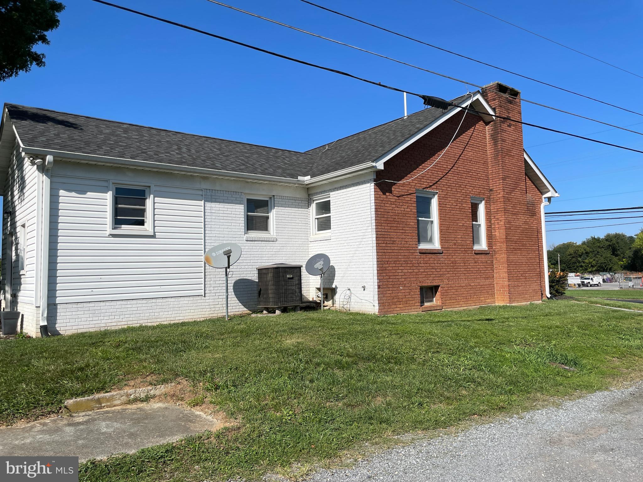 1067 North Mildred Street Ranson, WV 25438 - Photo 3 of 38 a view of a house with a yard