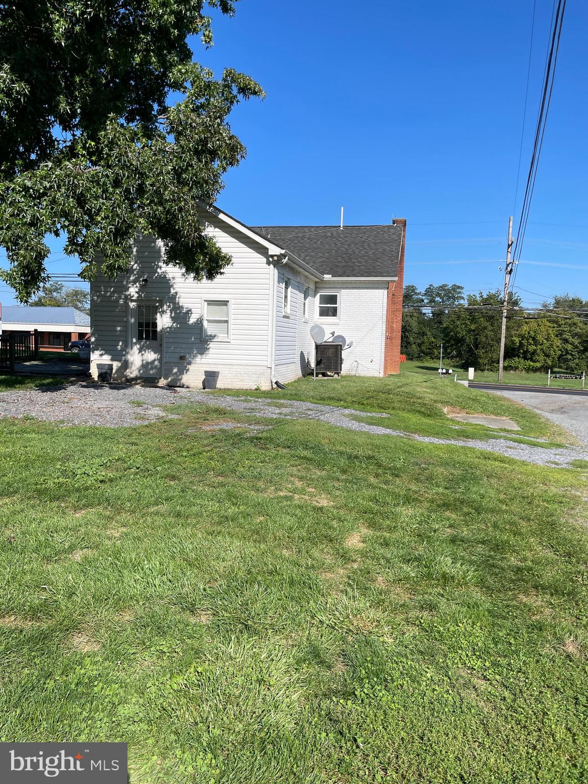 1067 North Mildred Street Ranson, WV 25438 - Photo 6 of 38 a house view with a play ground in front of it