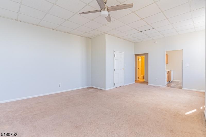 110 Cornelia Street, Unit 3 Boonton, NJ 07005 - Photo 1 of 14 an empty room with a empty space and windows