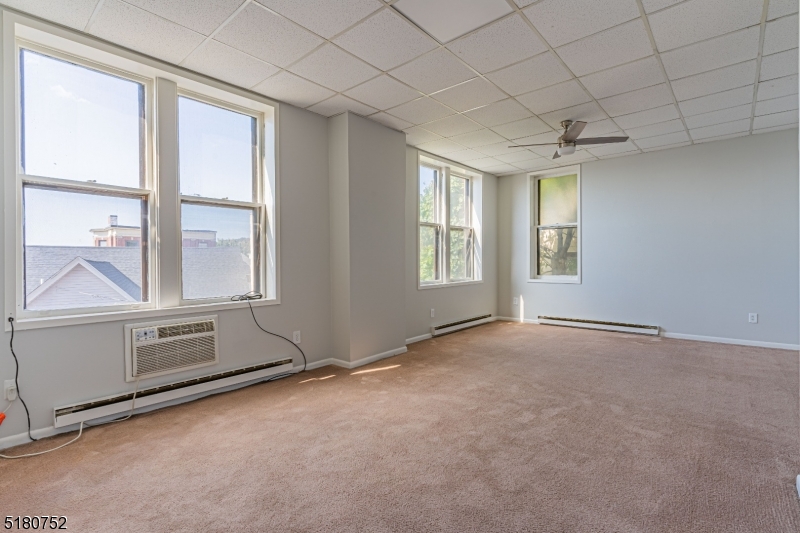 110 Cornelia Street, Unit 3 Boonton, NJ 07005 - Photo 4 of 14 a view of an empty room with a window