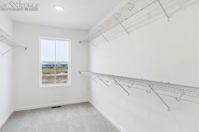 a view of a window in an empty room