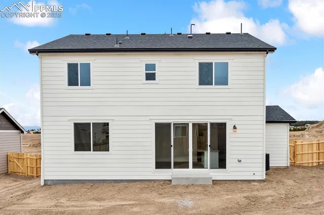 a view of a house with white door