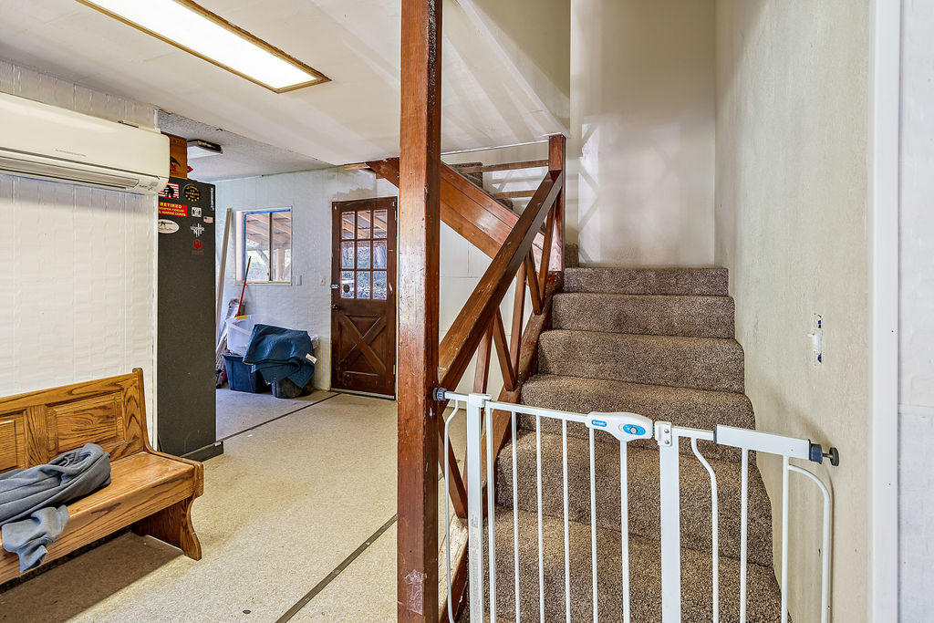 4832 Anderson Creek Road Talent, OR 97540 - Photo 20 of 39 a view of a livingroom with furniture and stairs