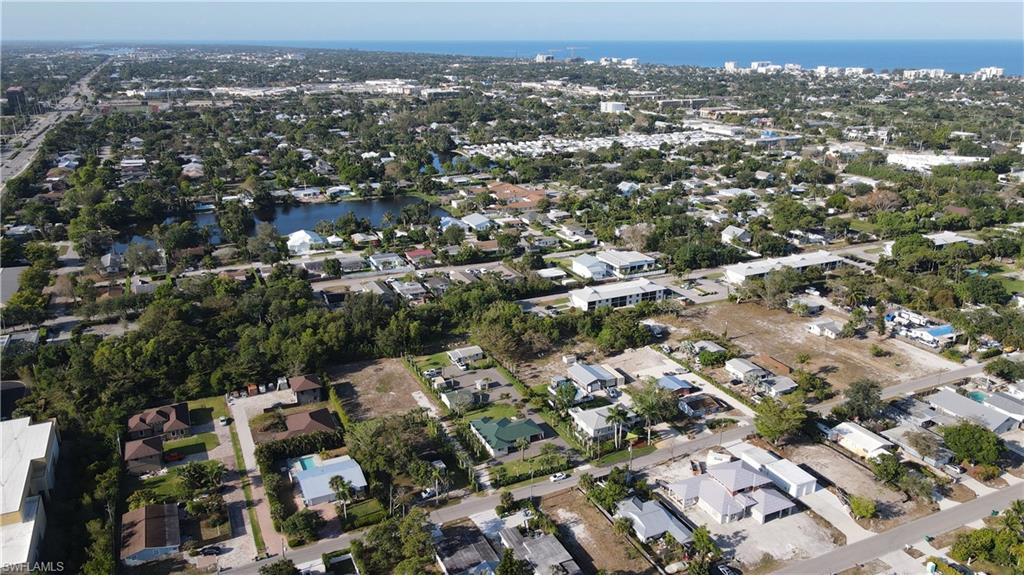 1308 Rosemary Lane Naples, FL 34103 - Photo 26 of 27 an aerial view of a city