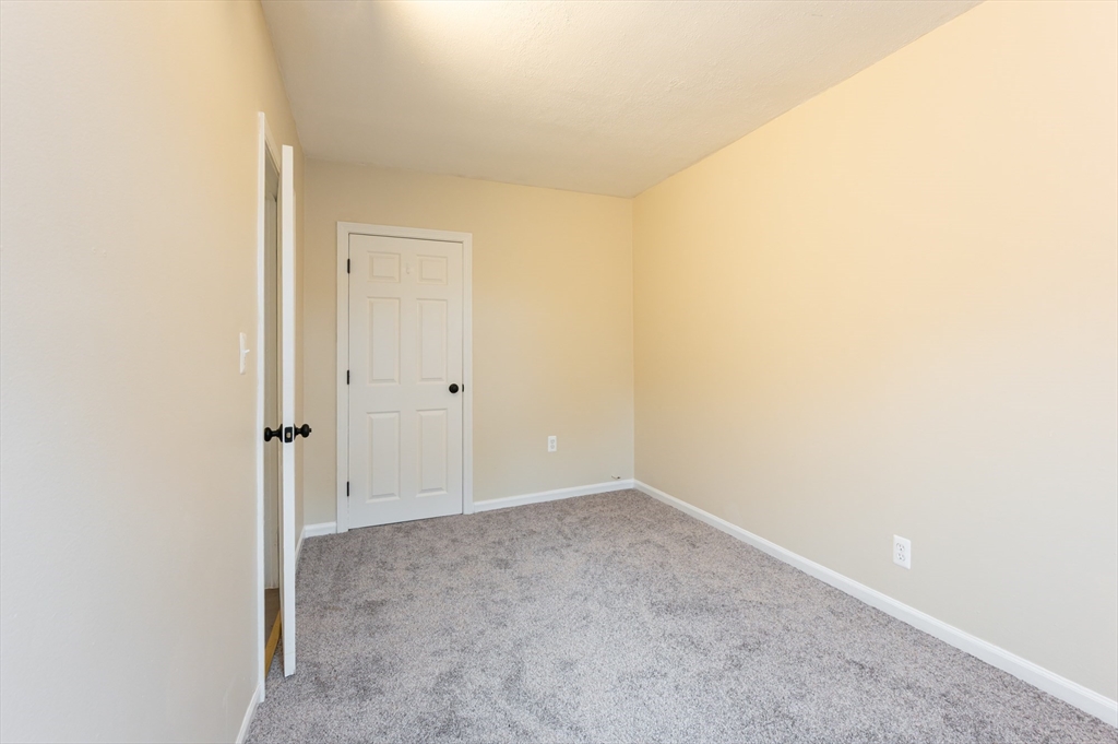 29 Mill Street, Unit B Dracut, MA 01826 - Photo 20 of 37 a view of an empty room
