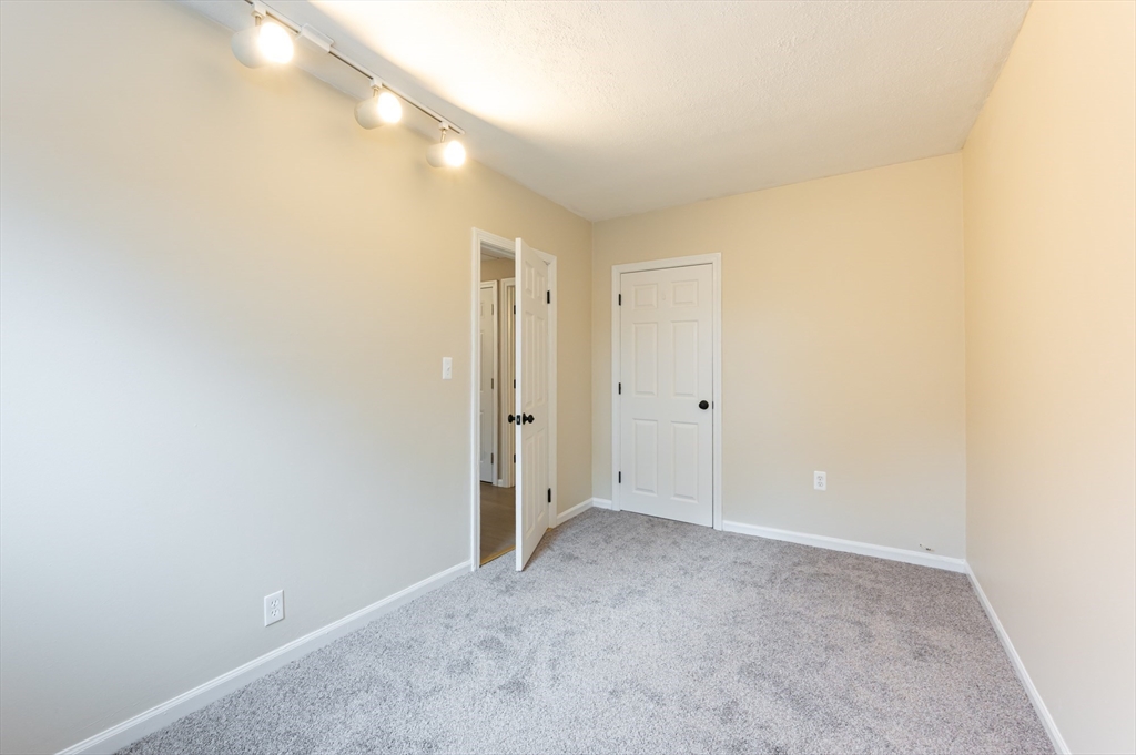 29 Mill Street, Unit B Dracut, MA 01826 - Photo 21 of 37 a view of room with window