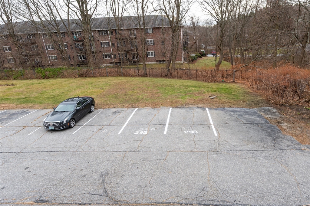 29 Mill Street, Unit B Dracut, MA 01826 - Photo 31 of 37 a view of a backyard
