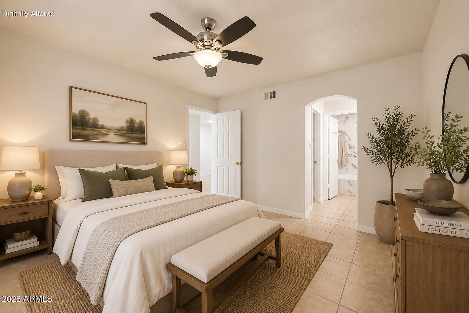 6885 East Cochise Road, Unit 142 Paradise Valley, AZ 85253 - Photo 25 of 47 a bedroom with a bed a mirror on dresser and a table