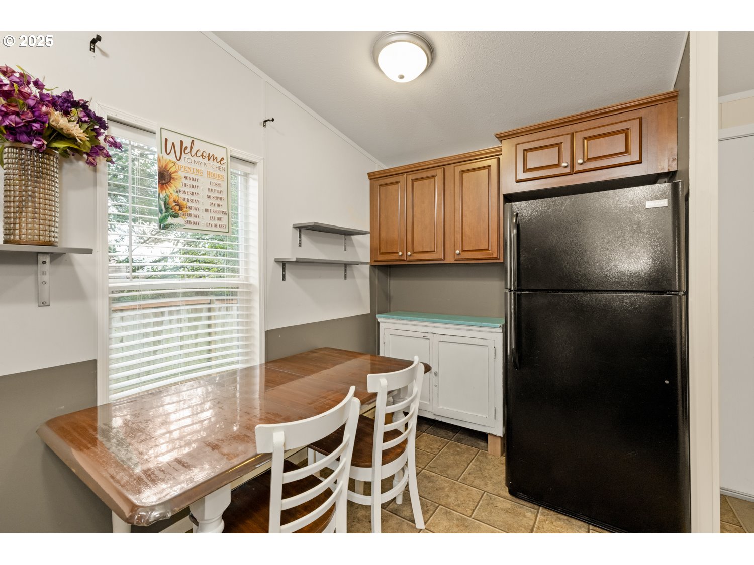 2696 Southeast Palmquist Road Gresham, OR 97080 - Photo 14 of 21 a kitchen with stainless steel appliances granite countertop a refrigerator and a stove top oven