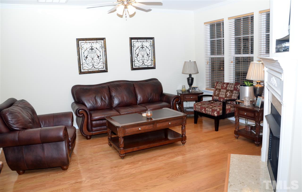5045 Celtic Court Raleigh, NC 27612 - Photo 7 of 25 a living room with furniture and a couch