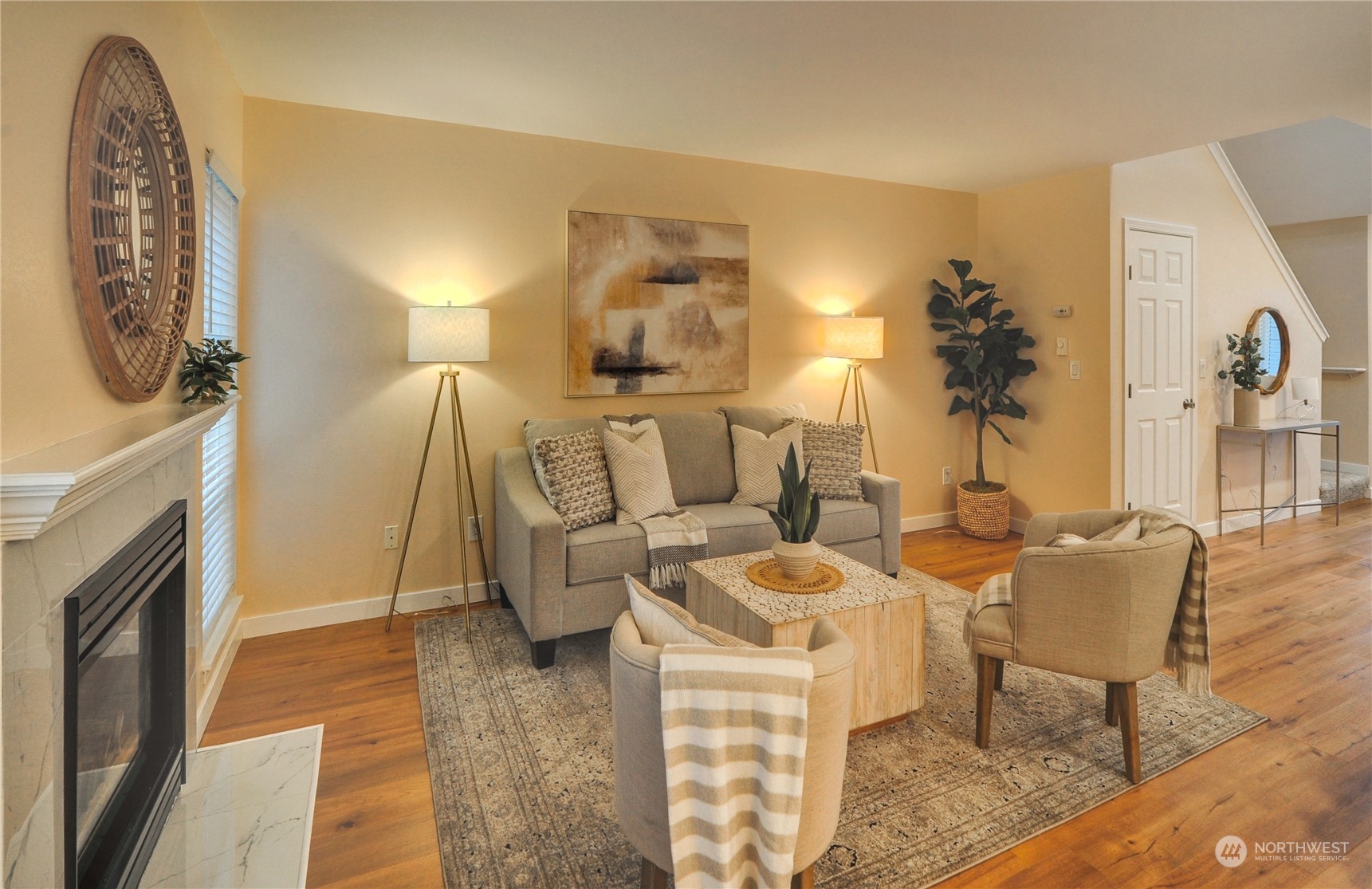23111 15th Avenue Southeast, Unit E3 Bothell, WA 98021 - Photo 12 of 30 a living room with furniture and a fireplace
