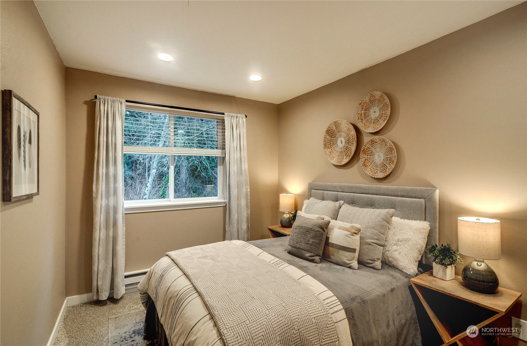 23111 15th Avenue Southeast, Unit E3 Bothell, WA 98021 - Photo 17 of 30 a bedroom with a bed and a window