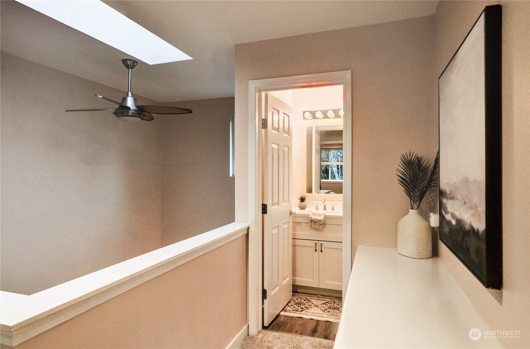 23111 15th Avenue Southeast, Unit E3 Bothell, WA 98021 - Photo 21 of 30 a bathroom with a sink and a mirror