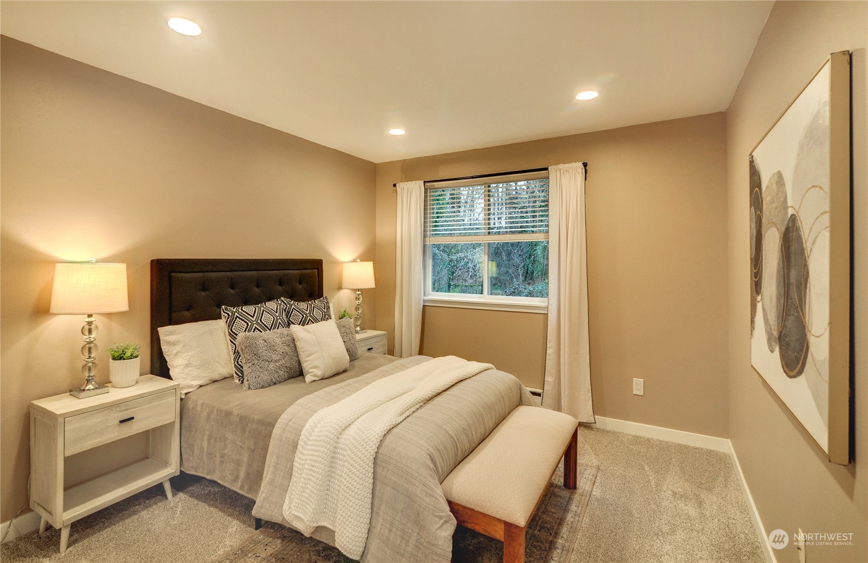 23111 15th Avenue Southeast, Unit E3 Bothell, WA 98021 - Photo 22 of 30 a bedroom with a bed and a window