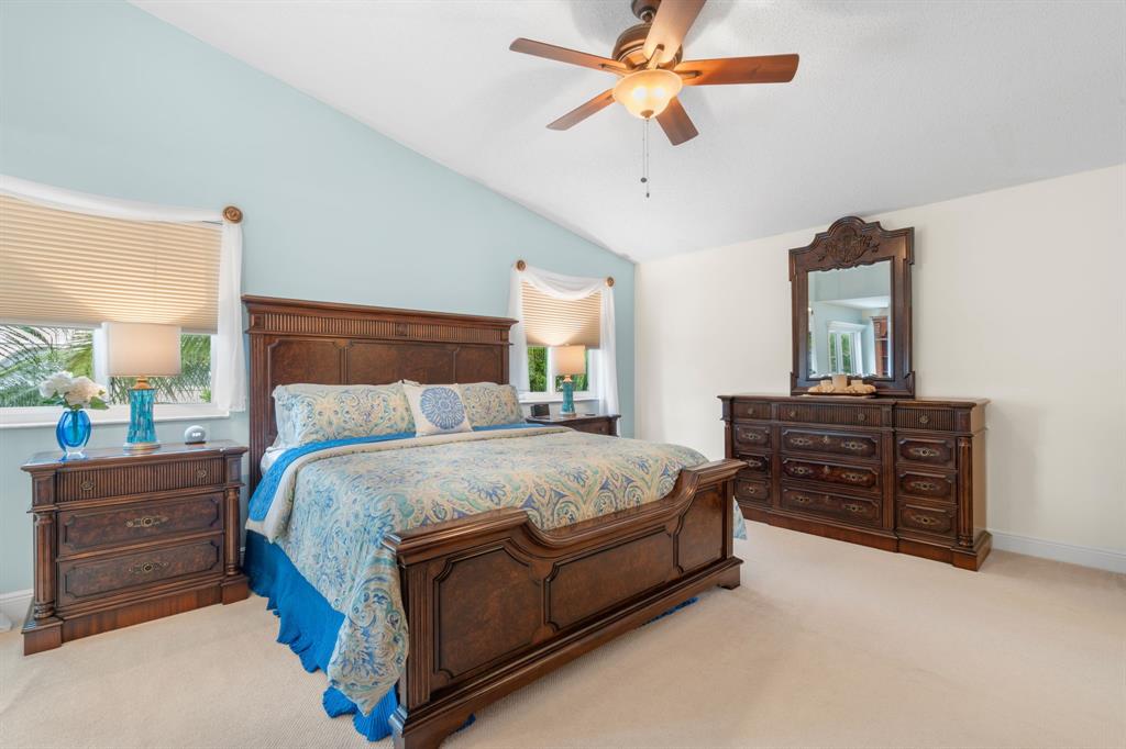 15256 Southwest 108th Terrace Miami, FL 33196 - Photo 21 of 40 a bed room with a bed and a dresser