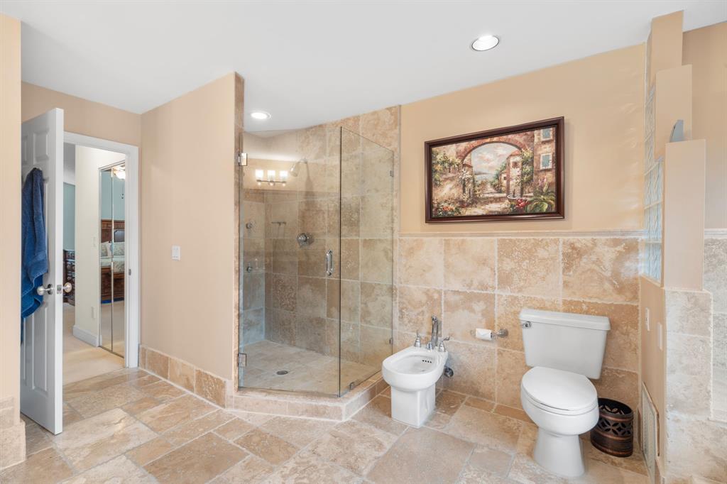 15256 Southwest 108th Terrace Miami, FL 33196 - Photo 25 of 40 a white toilet sitting next to a bathroom sink