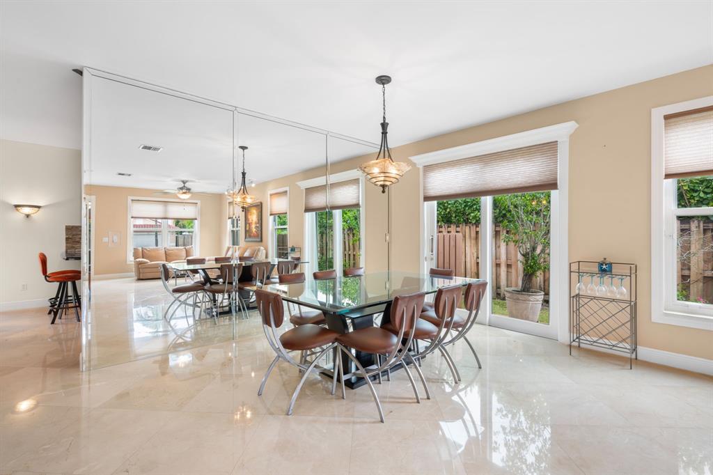 15256 Southwest 108th Terrace Miami, FL 33196 - Photo 7 of 40 a view of a dining room with furniture window and outside view