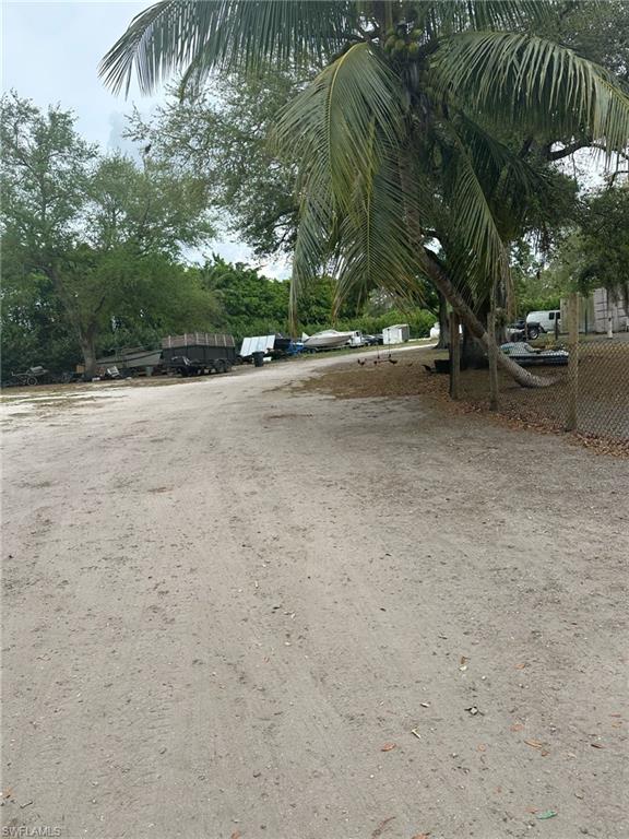 3525 D Road Loxahatchee, FL 33470 - Photo 7 of 11 a view of street with trees