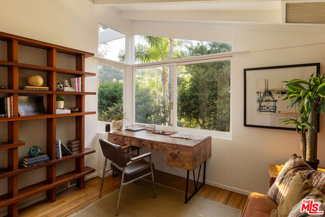 2764 Outpost Drive Los Angeles, CA 90068 - Photo 12 of 37 a dining room with furniture window and wooden floor