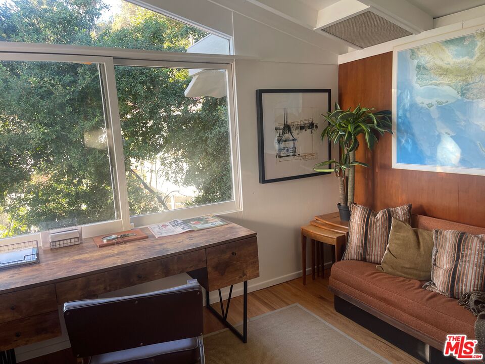 2764 Outpost Drive Los Angeles, CA 90068 - Photo 13 of 37 a living room with furniture and a potted plant