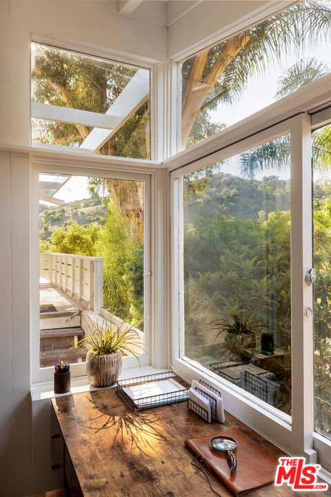 2764 Outpost Drive Los Angeles, CA 90068 - Photo 14 of 37 a living room with large window