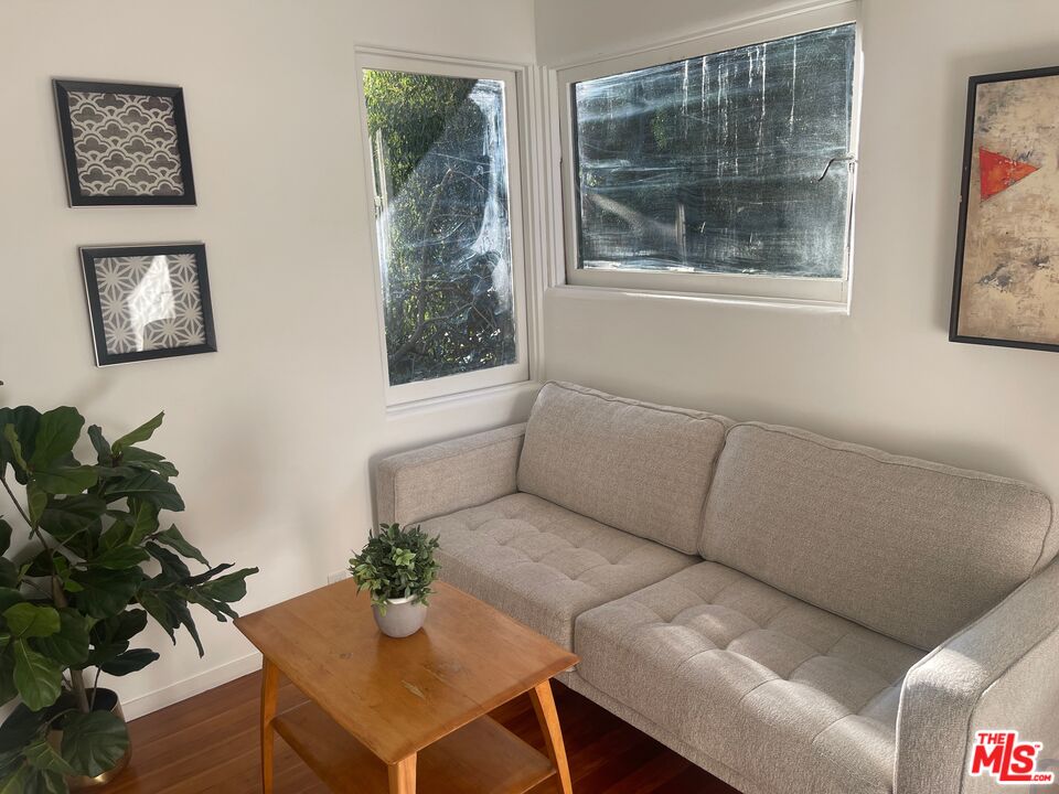 2764 Outpost Drive Los Angeles, CA 90068 - Photo 20 of 37 a living room with furniture and a potted plant