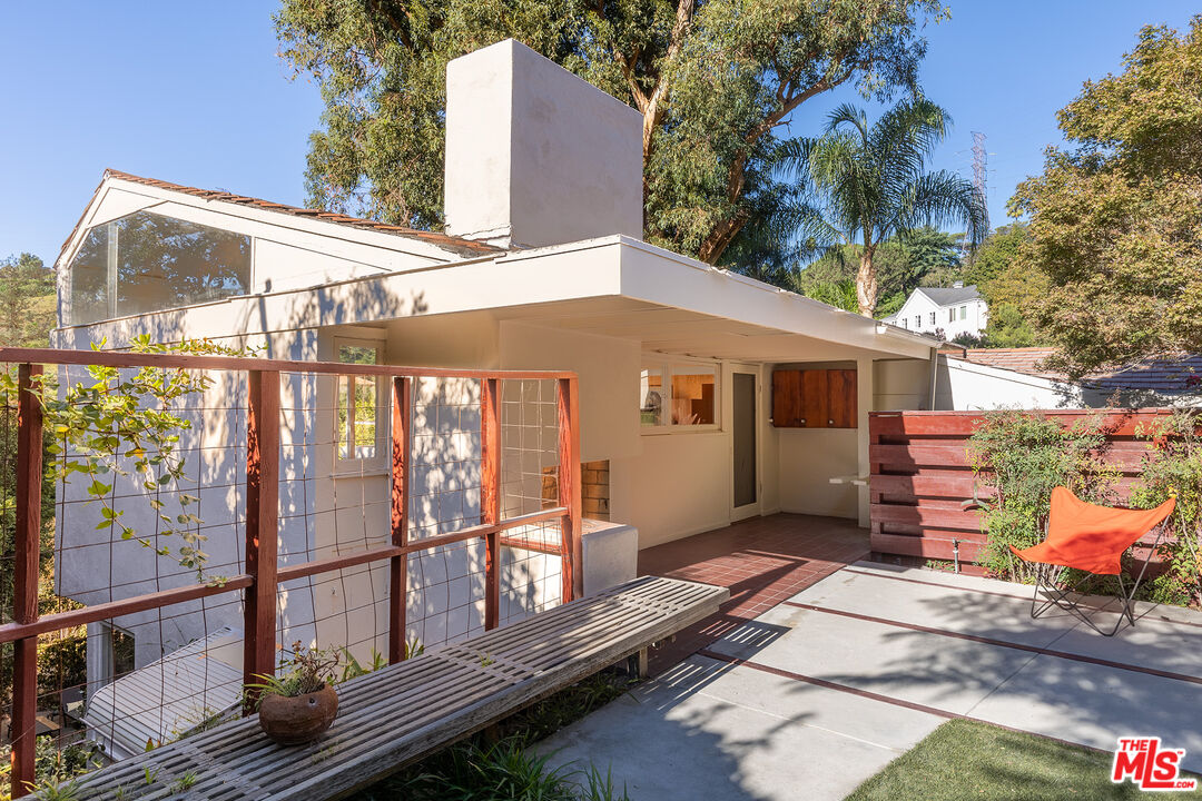 2764 Outpost Drive Los Angeles, CA 90068 - Photo 24 of 37 a front view of a house with a balcony