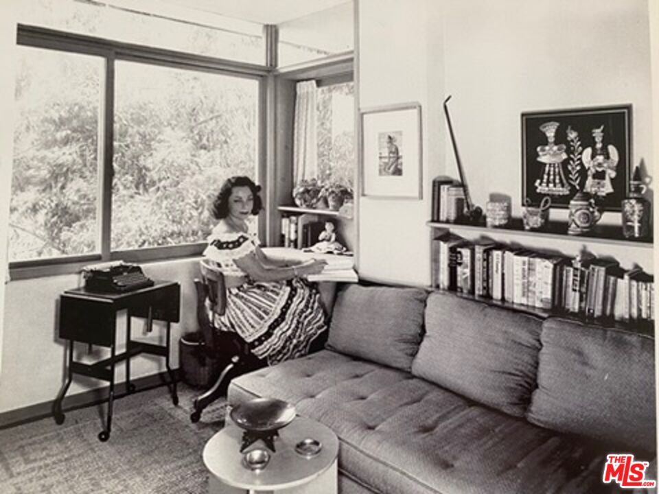 2764 Outpost Drive Los Angeles, CA 90068 - Photo 33 of 37 a living room with furniture and a large window