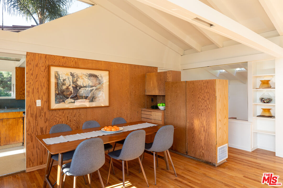 2764 Outpost Drive Los Angeles, CA 90068 - Photo 4 of 37 a view of a dining room with furniture and wooden floor