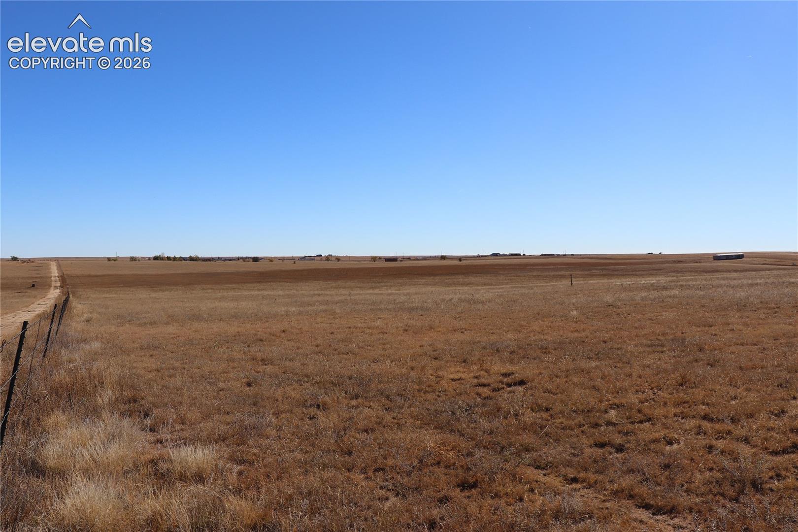 35520 Bowen Road Yoder, CO 80864 - Photo 8 of 21 View of yard with a rural view