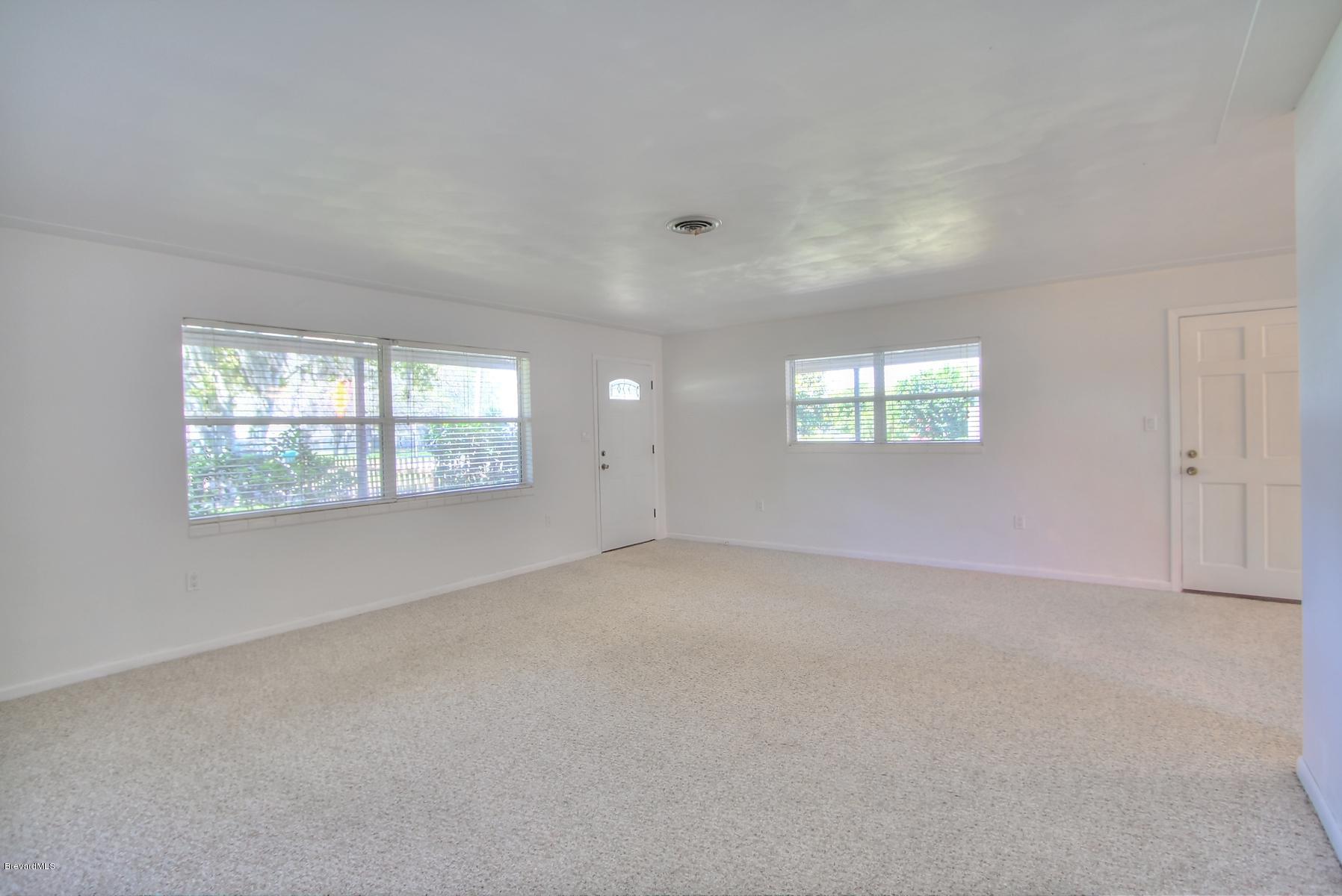 972 Sarno Road Melbourne, FL 32935 - Photo 11 of 20 Spacious Living Room & Foyer