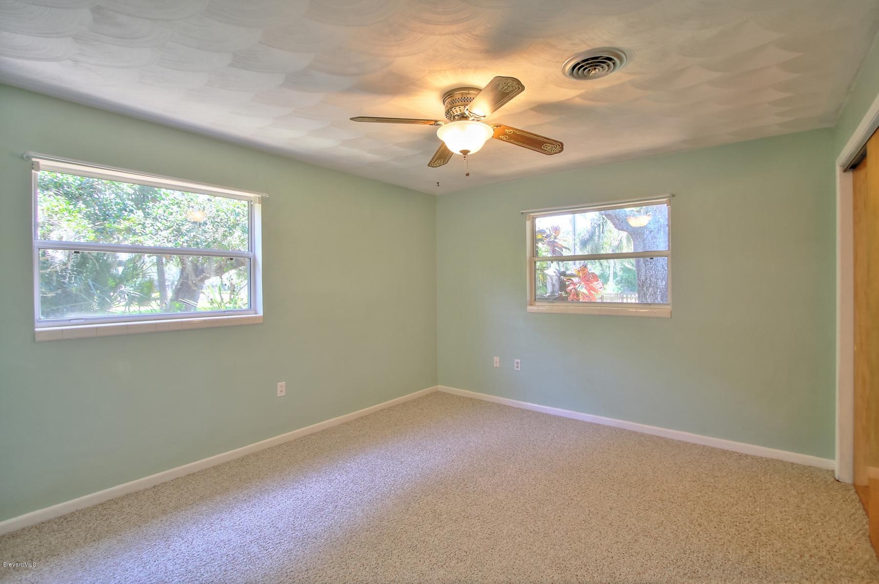972 Sarno Road Melbourne, FL 32935 - Photo 16 of 20 Guest Bedroom with New Windows, New Pain