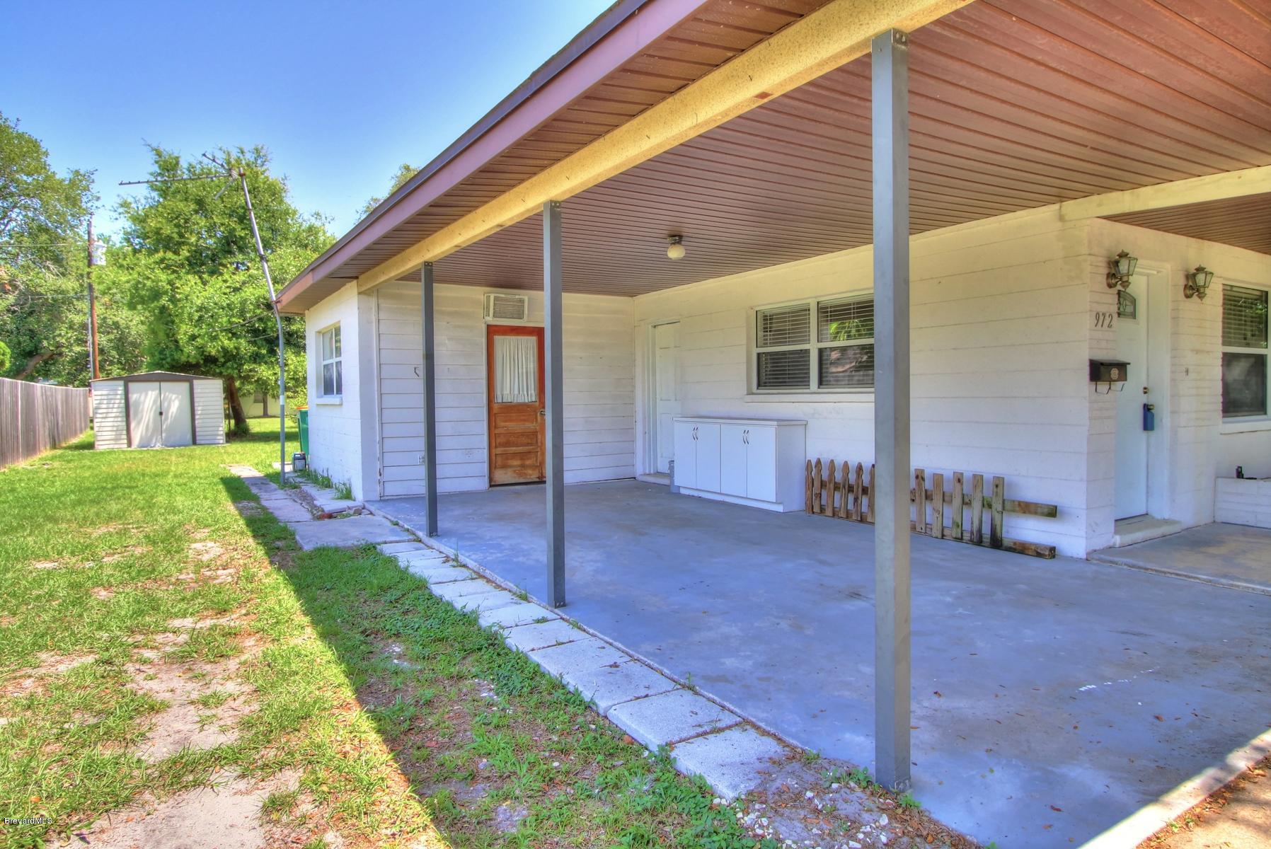 972 Sarno Road Melbourne, FL 32935 - Photo 18 of 20 Carport/ Air Conditioned Laundry / Stora