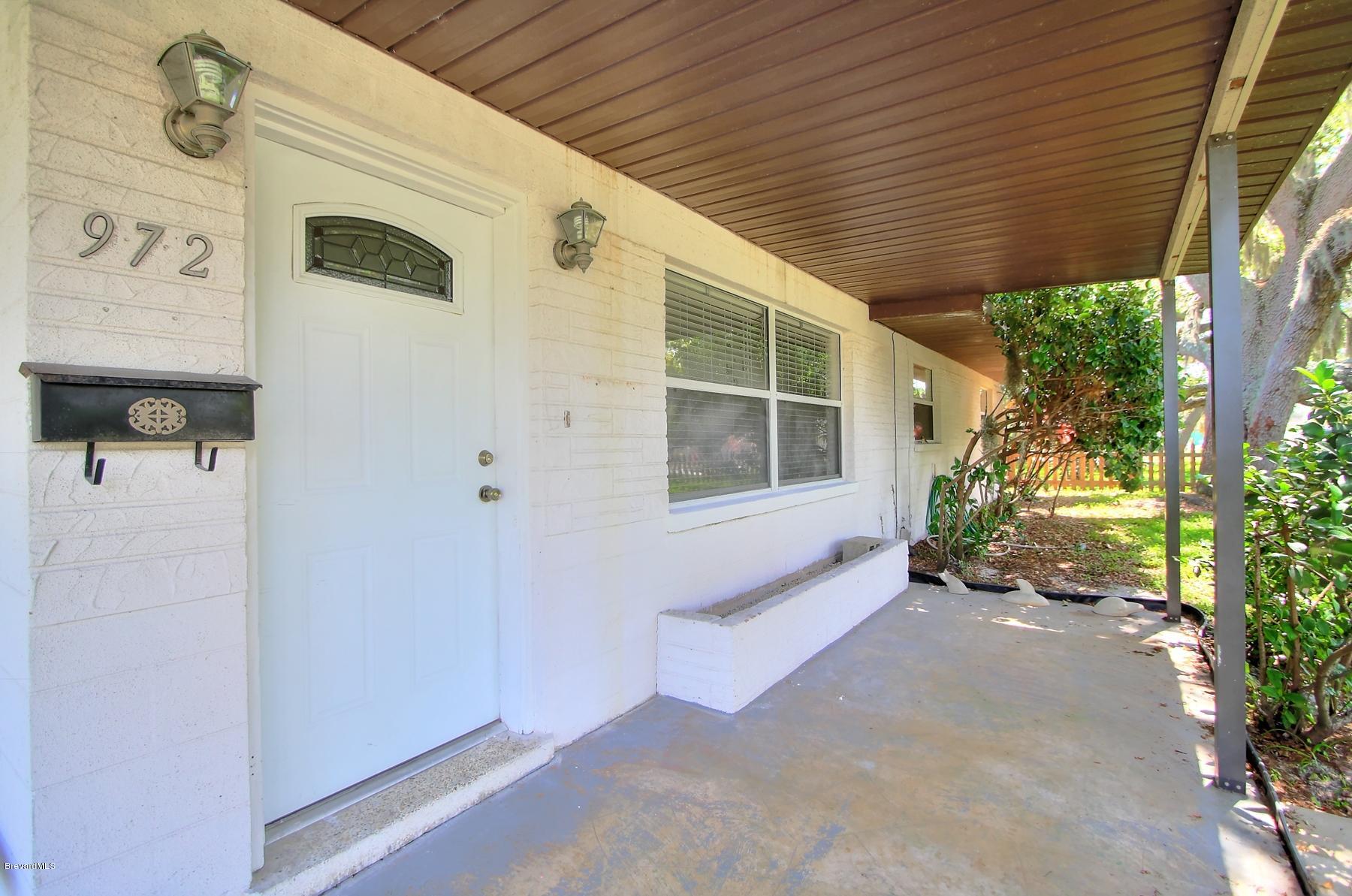 972 Sarno Road Melbourne, FL 32935 - Photo 5 of 20 Spacious Shady Front Porch