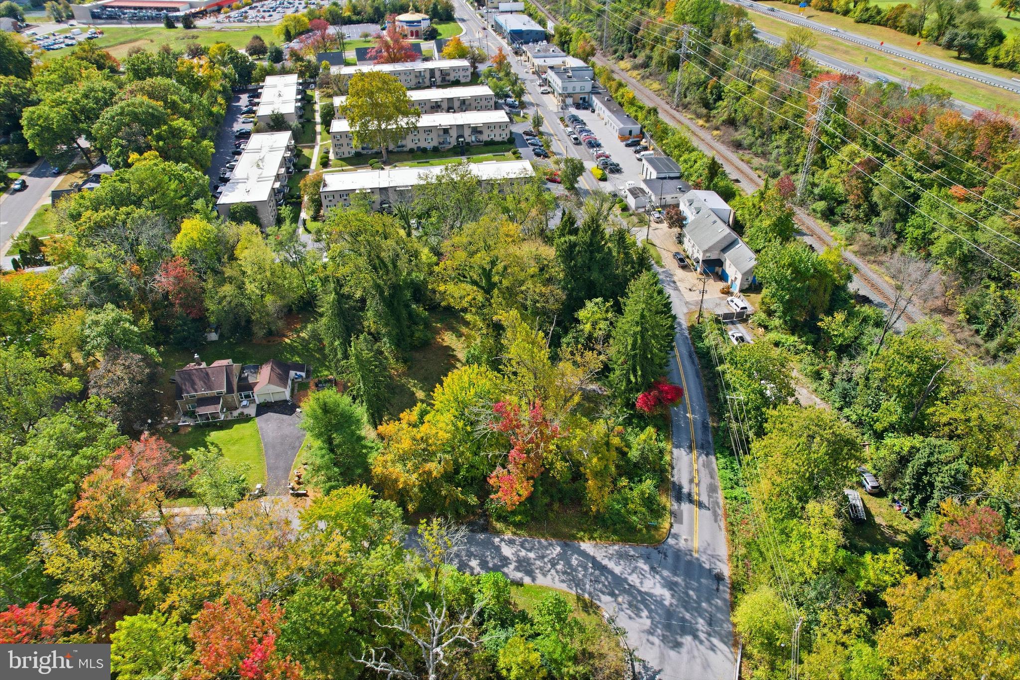4318 Miller Road Wilmington, DE 19802 - Photo 12 of 17 an aerial view of residential houses with outdoor space and trees