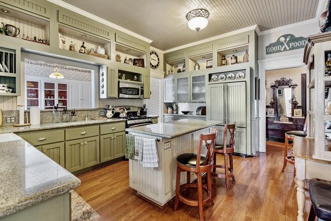 610 San Felipe Road Gilroy, CA 95020 - Photo 20 of 52 a kitchen with stainless steel appliances granite countertop a table chairs refrigerator and a sink