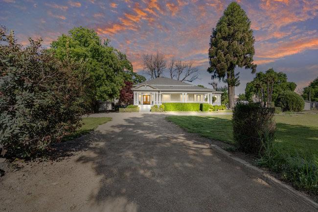 610 San Felipe Road Gilroy, CA 95020 - Photo 39 of 52 a view of a house with a big yard and a large trees