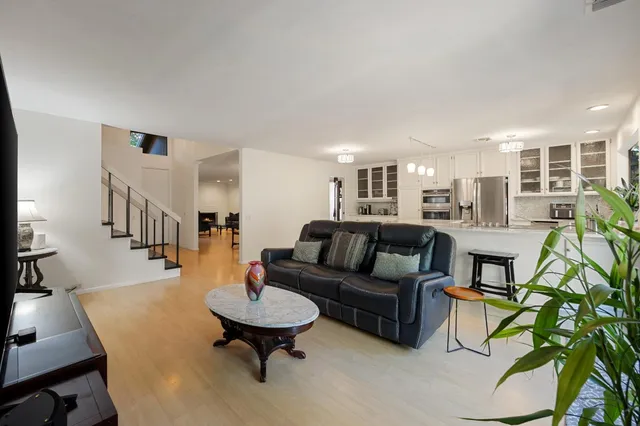 a living room with furniture and a table
