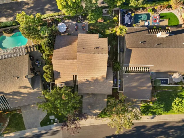 an aerial view of a house with a garden