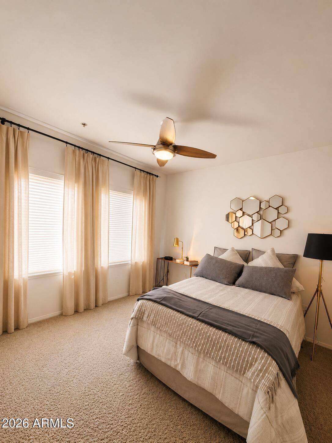 2150 West Alameda Road, Unit 1020 Phoenix, AZ 85085 - Photo 21 of 35 a spacious bedroom with a bed and a window
