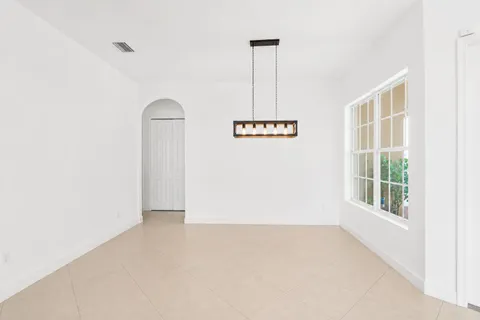 $875,000 | 11394 Millpond Greens Drive, Boynton Beach, FL 33473
