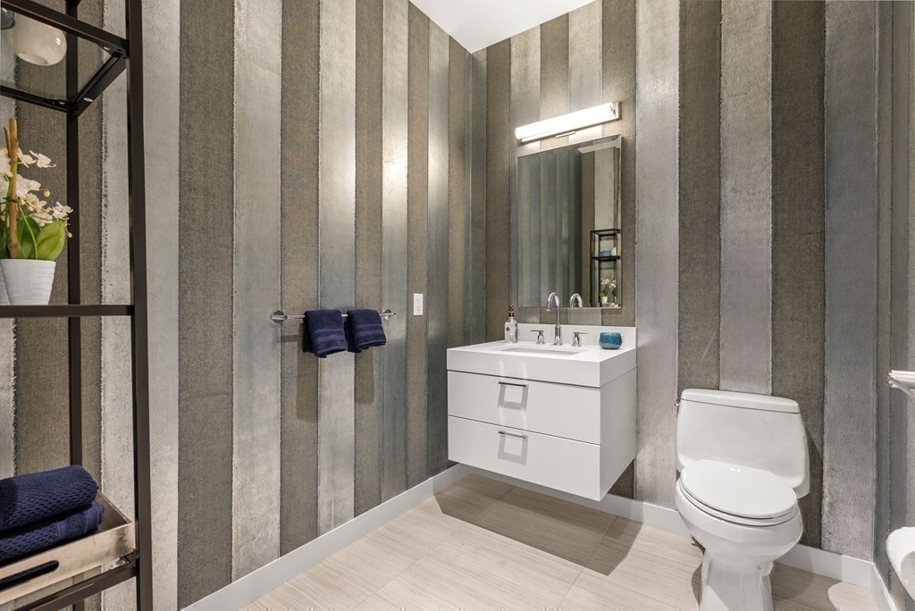 300 Pier 4 Blvd., Unit PHC Boston, MA 02210 - Photo 17 of 42 a bathroom with a sink a toilet and shower