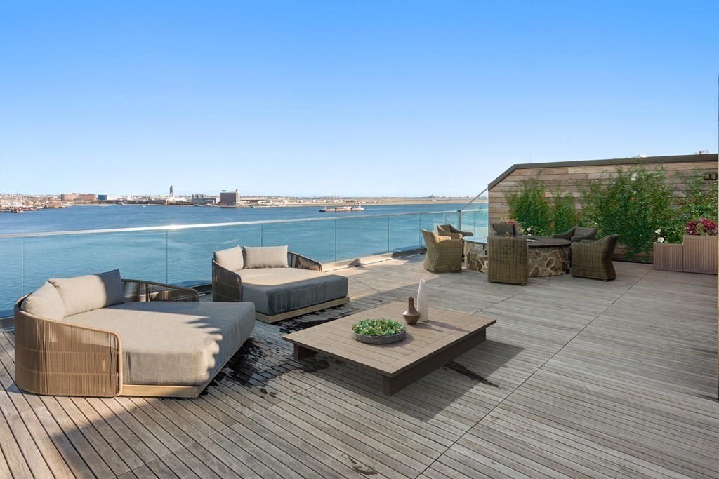 300 Pier 4 Blvd., Unit PHC Boston, MA 02210 - Photo 29 of 42 a terrace with outdoor seating and city view