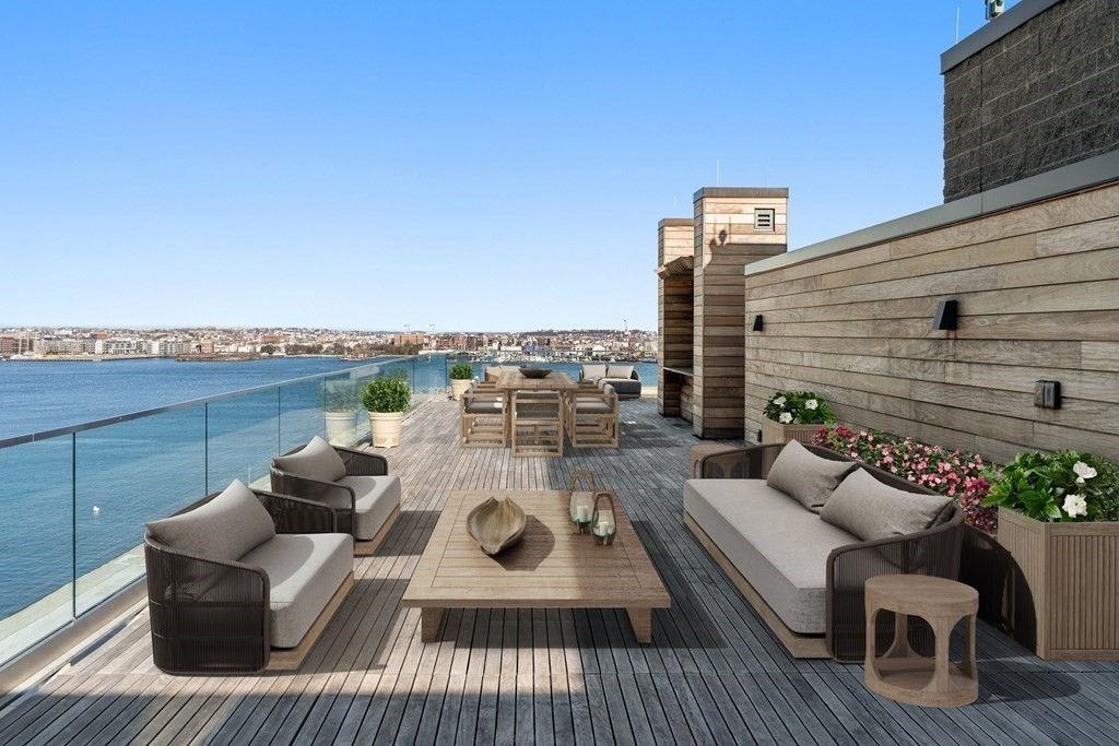 300 Pier 4 Blvd., Unit PHC Boston, MA 02210 - Photo 30 of 42 a view of a balcony with couch and chairs