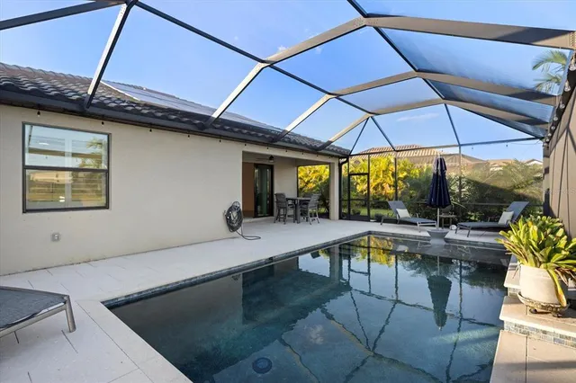 a very nice looking dining room with a table and chairs