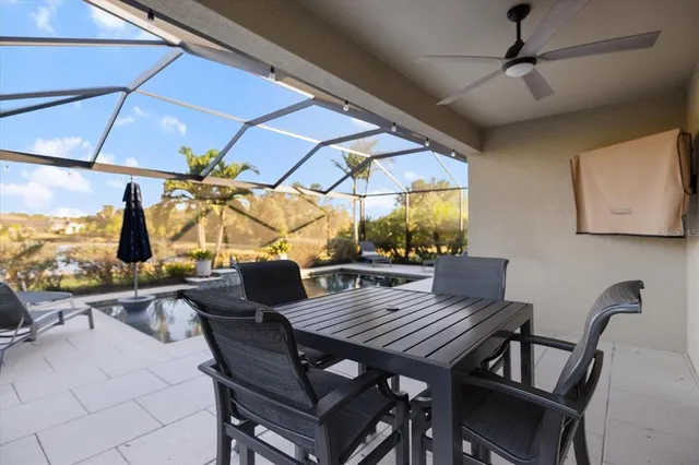 a view of a swimming pool with a porch