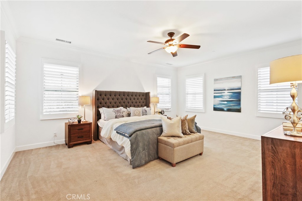 64 Hazelton Irvine, CA 92620 - Photo 12 of 23 a bedroom with a bed couch and window